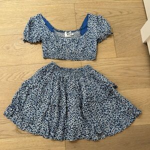 This is a Princess Polly Skirt set. This is a blue and white flower set.